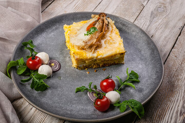 Omelet with fish fillet. Baked pangasius with spices and herbs. Mozzarella cheese, cherry tomatoes and arugula leaves. Mediterranean Kitchen