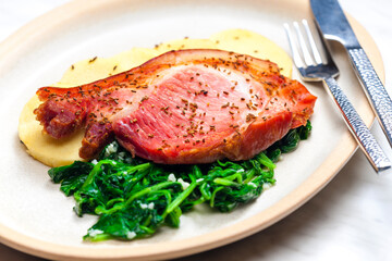 smoke meat with spinach and potato dumplings