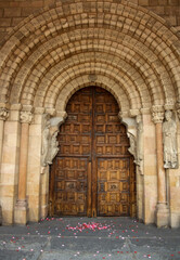 Fototapeta na wymiar Door of the Basilica de San Vicente church in Ávila, Spain. It is one of the best examples of Romanesque architecture in the country.