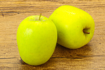 Two ripe green sweet apples