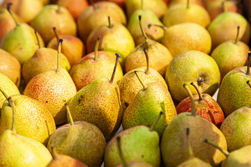 Yellow pears with red dots in the grocery stock