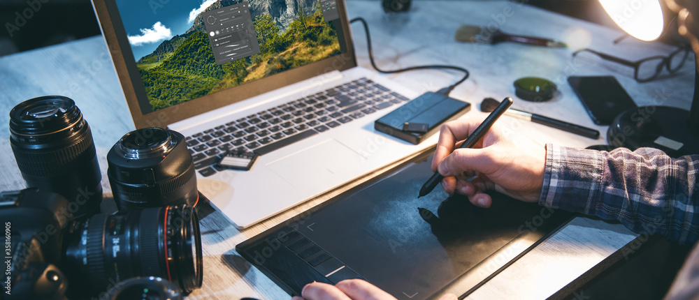 Fototapete graphics tablet and camera with computer on table