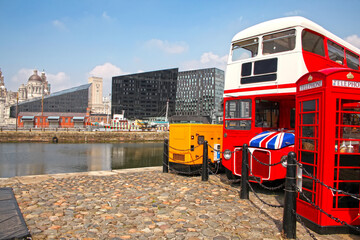 City views of the historic Canning Dock with a traditional bus & telephone box on the River Mersey,...
