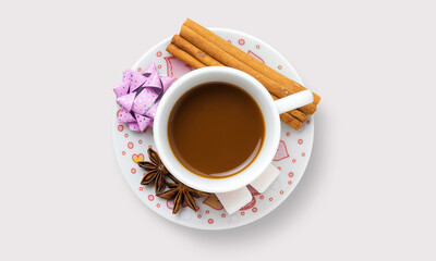 Coffee in a cup on a plate on a white background