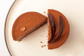 2 pieces of chocolate velvet cake on the plate. delicious dessert for tea. top view