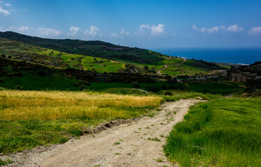 Water meadows and hills on the Mediterranean coast on the island of Cyprus.