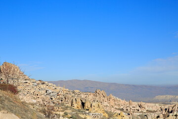 Fototapeta na wymiar The magnificent Cappadocia valley with its rocky structure formed by volcanic tuffs. Nevsehir, Turkey