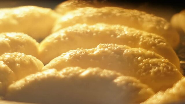 Timelapse of Freshly baked croissants. Classic Viennoiserie made of puff pastry looking yummy. French bakery concept.