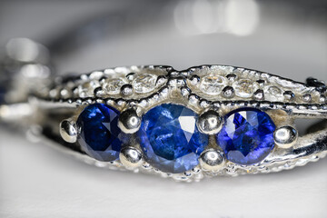Blue sapphires in an engagement ring with zircons.