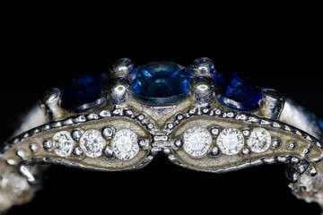 Blue sapphires in an engagement ring with zircons.