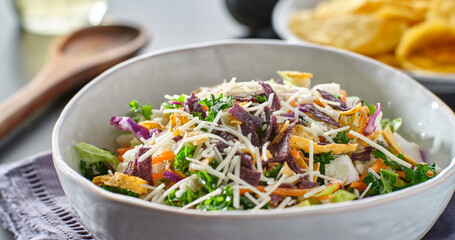 crunchy mexican salad with multi color tortilla strips
