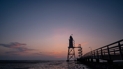 sunset on the pier - Lighthouse Obereversand - Wurster Nordseeküste
