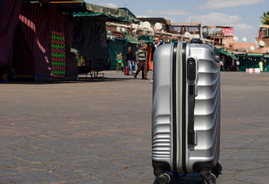 A travel bag standing in the quiet souks of Marrakech, few people walking around, before the nationwide lockdown started, because of the coronavirus. 17 March 2020 Medina, Marrakech, Morocco