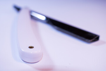 Barber's razor on white isolated background.