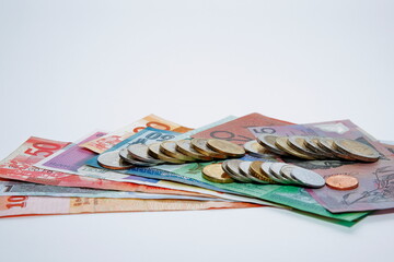 A composition with various country banknotes and coins.