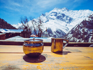 A cup of tea in the middle of Himalayas
