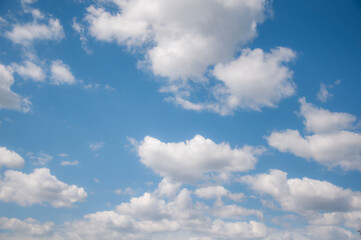 White clouds on a blue sky. Beautiful natural background.