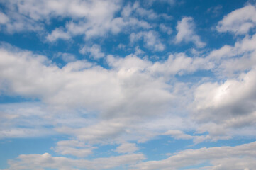 White clouds on a blue sky. Beautiful natural background.