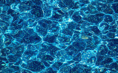 Fototapeta na wymiar Swimming pool blue background pattern