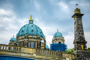 Naklejka premium Tourist boat on the river Spree at the cathedral of Berlin, Germany