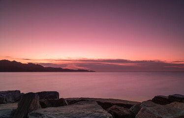 Romantic Pink Sunset in the Gulf of Saint Florent, Corsica.  Long exposure