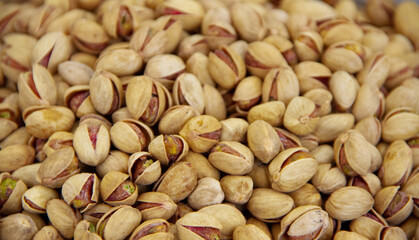 Salty pistachios in the grocery stock