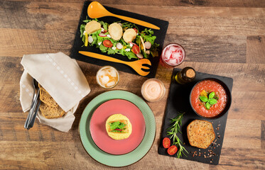 Arugula salad, mashed fish and gazpacho soup.