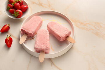 Plate with tasty strawberry ice cream on light background