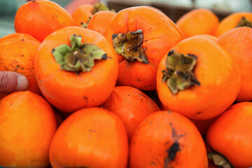 Fresh date plums in the market stocks