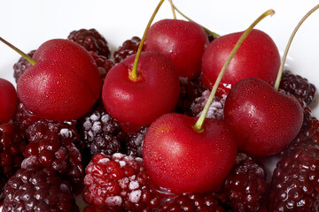 Frozen Berries. Freezing berries of cherry and blackberry. 