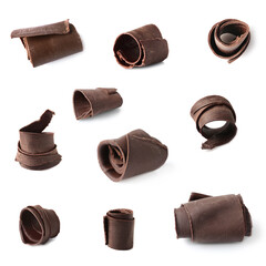 Set with yummy chocolate curls on white background