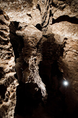Dark Tunnel Cave has nobody. Tourist route, tours, adventures and interesting places. inside ancient crystal formations, stones, geology, explore of rocks of the soil. village Mlynky . Ukraine