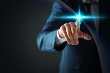 Man pressing button on virtual screen, closeup