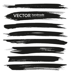 Big black long brush strokes set isolated on a white background