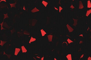 Black abstract background with red crystals pattern