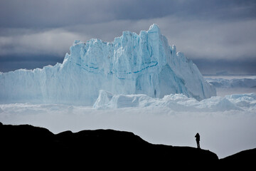 Icebergs piled up in the icefiord, calved from Sermeq Kujalleq glacier, Ilullisat, Disko Bay, West Greenland © Michele Burgess