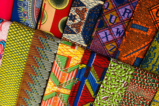 Traditional West African fabric for sale on the street outside a shop in Ghana, West Africa