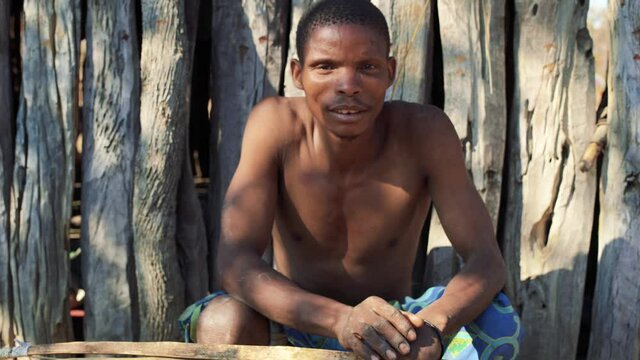 Koisan man with bow and arrow, Chomipapa, Angola