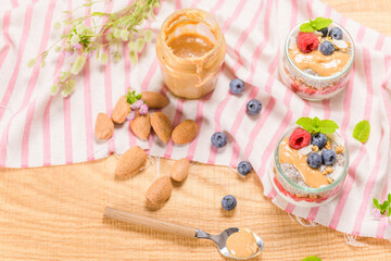 Fototapeta na wymiar Chia pudding with oat and berries