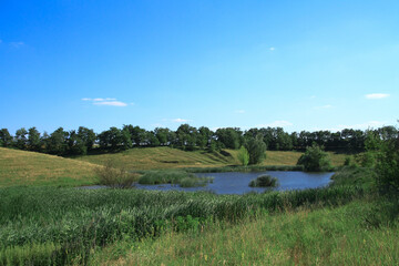 Beautiful river in a pretty area in Siberia. Landscape in Canada with a cold lake. Stock photo background.