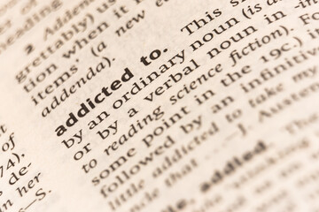 Fototapeta premium Dictionary definition of the word addicted