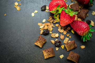 chocolate chip cookies on the table with strawberries