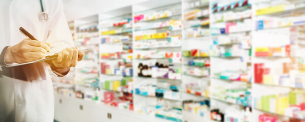 Blurret image doctor records the prescriptions in the hospital room of the hospital : Blurred background