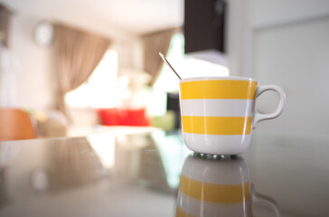 Coffee cup on breakfast table 