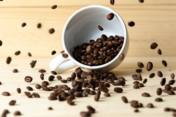 cup, coffee beans and wood