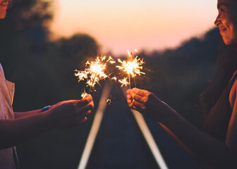 Abstract blur sparklers for celebration background,Motion by wind blurred woman hand holding...