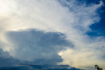 White clouds against a blue sky.