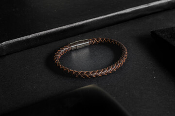 Fototapeta premium leather bracelet on black background