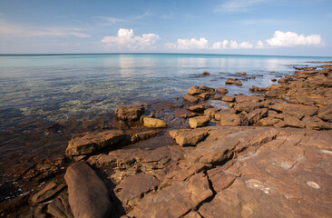 clouds over the stone beach