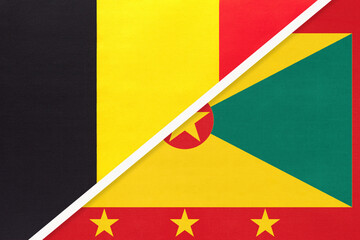 Belgium and Grenada, symbol of two national flags from textile. Championship between two countries.